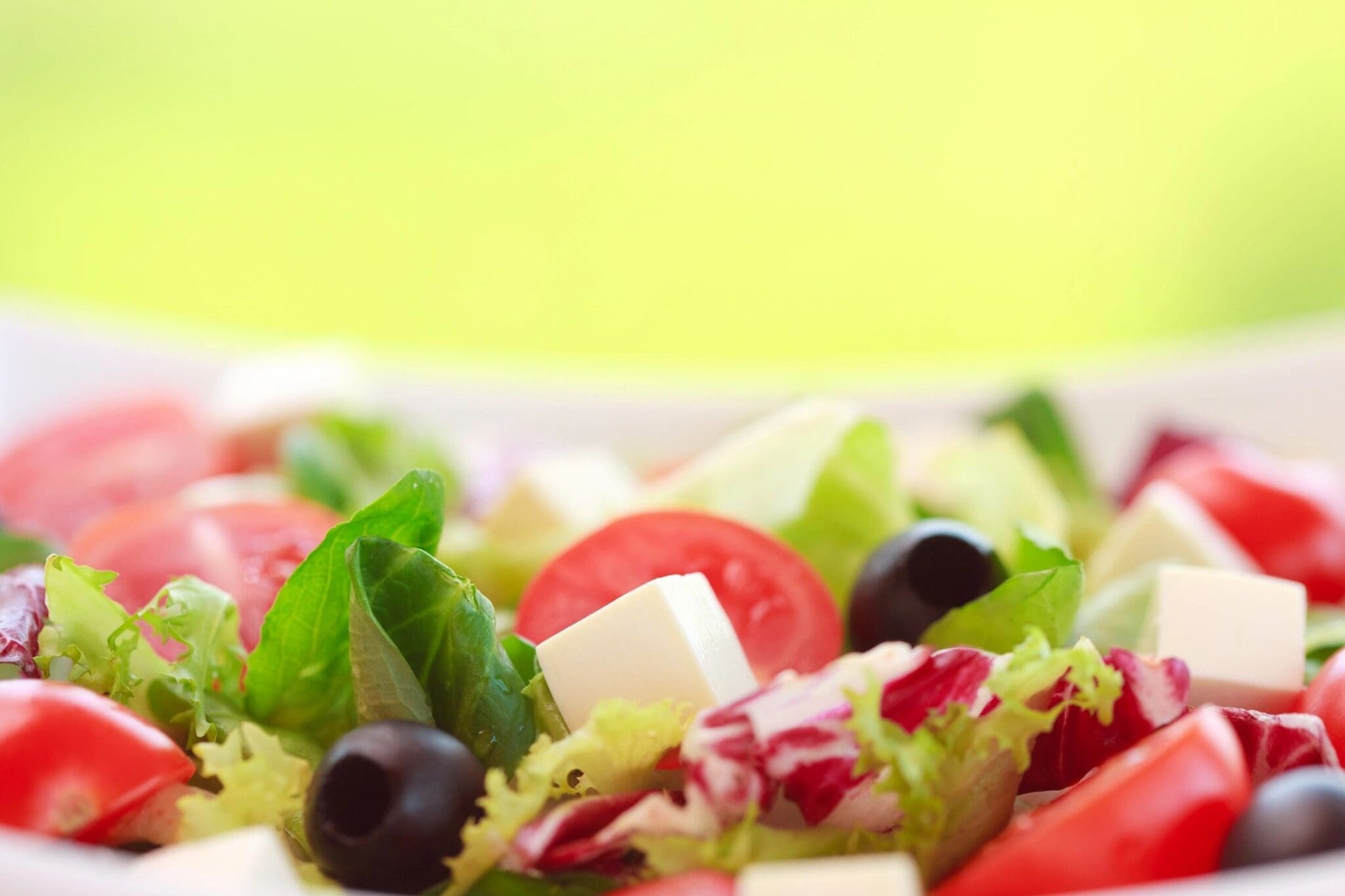 A close up of salad on a plate