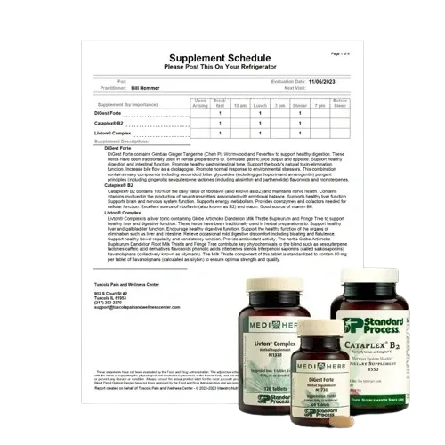 A picture of some supplements and a document.