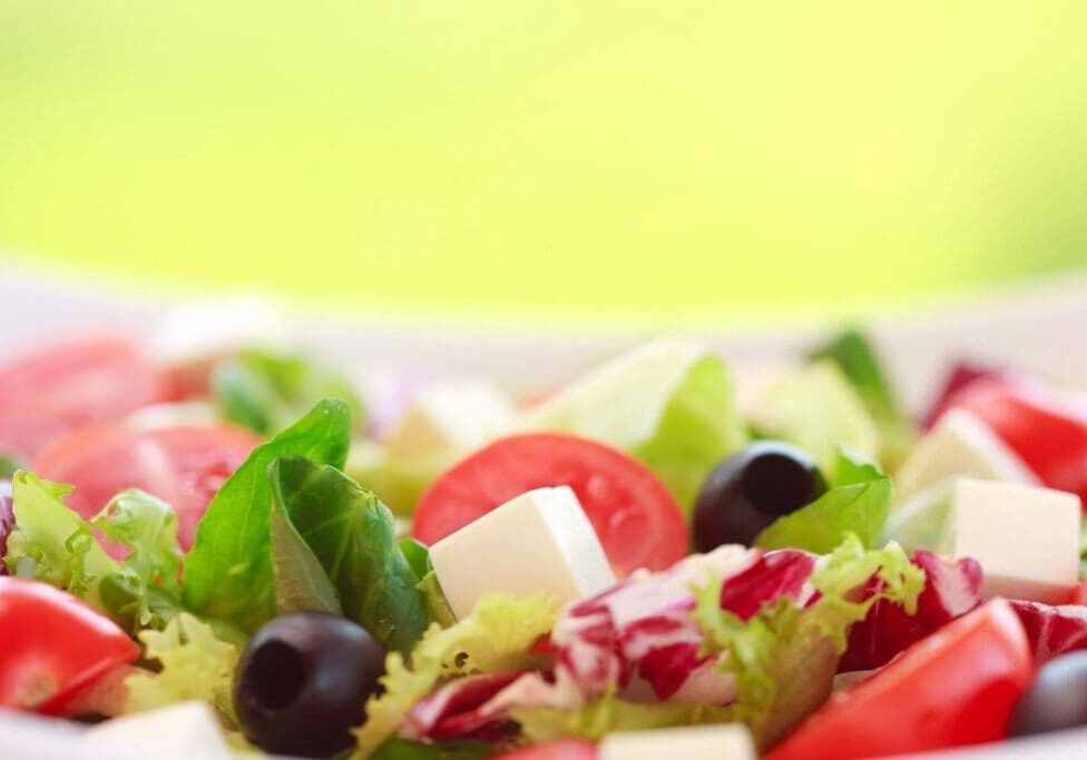 A close up of salad on a plate